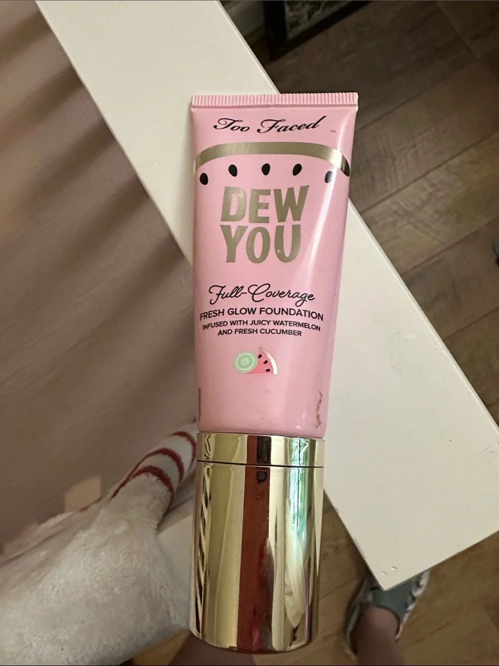 Too Faced Dew You Foundation - Pink & Gold Packaging maple in color